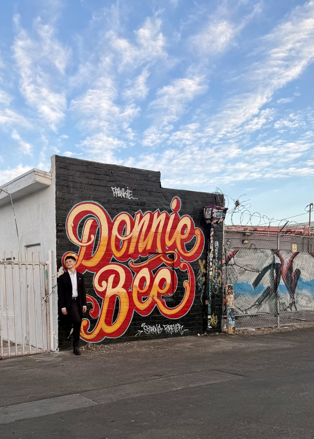 Donnie by a colorful mural